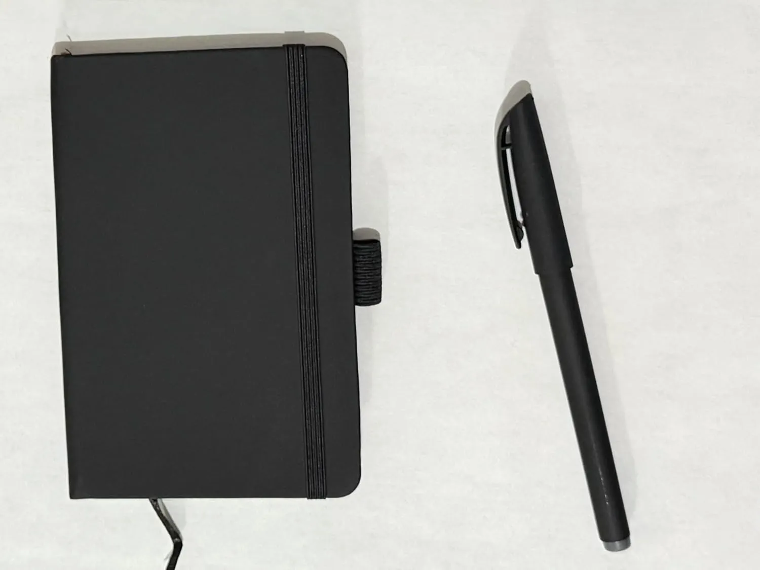 Pocket Notebook with Elastic Band Closure, Black Hardcover Journal with Matching Pen, A6 Size